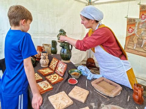 Living history display on medieval pottery and tile making